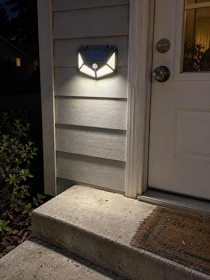 Solar light illuminating a porch step after dark
