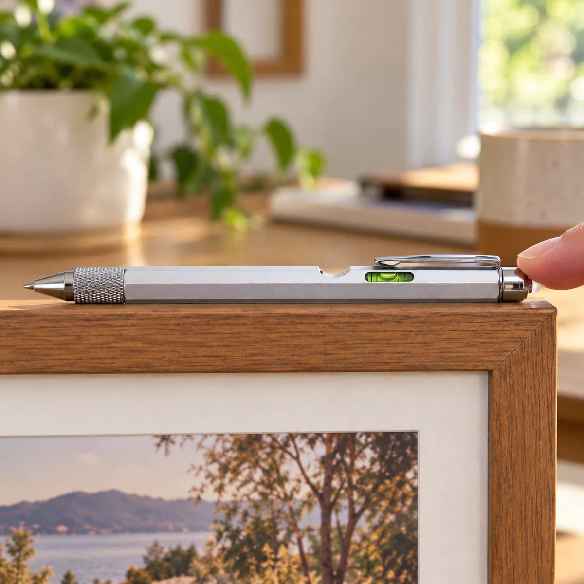 Multitool pen bubble level checking a small frame